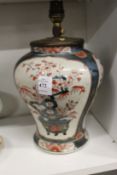 A Japanese Imari baluster shaped vase converted to a lamp.
