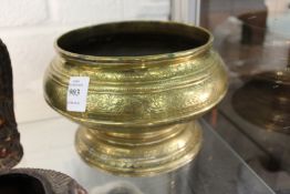 A good eastern engraved brass circular pedestal bowl.