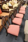 A set of six Victorian mahogany dining chairs.