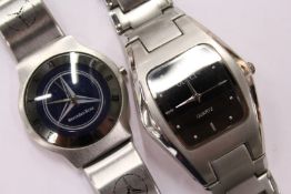 Two designer watches.