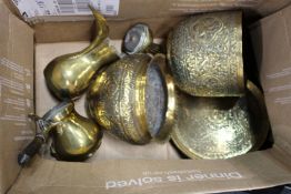Eastern embossed brass jardinieres and other items.