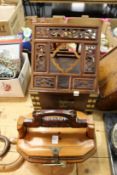 A Chinese wooden sewing basket and a table top box with folding stand.