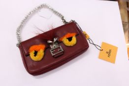 A designer style handbag.