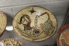 An early Islamic pottery bowl.