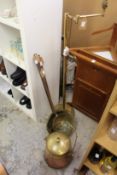 Copper and brass ware and a floor standing lamp.