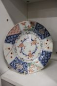 An 18th century Japanese Imari plate, six character mark to the base.