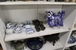 A Chinese gilt and blue decorated model of a lion together with other oriental porcelain.