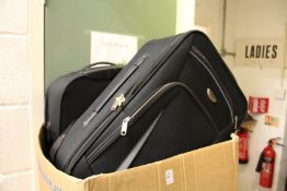 Two suitcases and a quantity of Christmas decorations.