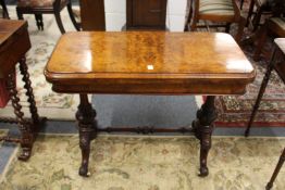 A good Victorian figured walnut rounded rectangular foldover card table.