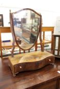 A mahogany dressing table mirror with shield shaped mirror.