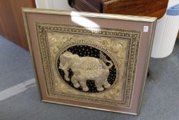 A large Thai metal thread embroidered picture of an elephant.