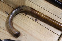 A wooden walking stick.