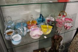 A good collection of decorative opaque and painted glass wedding baskets.
