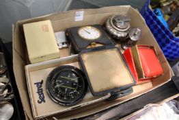 Travelling clocks, cigarette lighters etc.