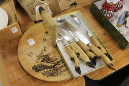 A carving set and stand.