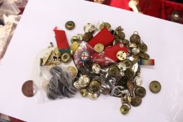 A large quantity of military buckles, badges etc.