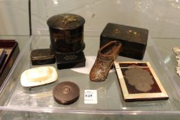 A tortoiseshell and mother-of-pearl calling card case with inlaid decoration, a shoe shaped snuff