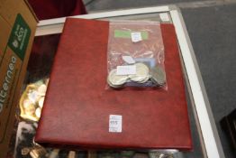 An album containing a quantity of pre-decimal and later coinage and some loose coins and collector's