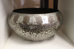 An eastern metal bowl.
