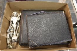 Silver and other flatware.