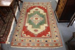 A Persian design carpet.