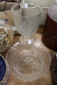 A large cut glass bowl and similar pedestal vase (chips).