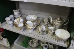 19th century part tea services with gilt decoration.