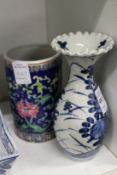 A Chinese blue and white frilly edged porcelain vase and a Famille Rose brush washer.