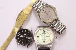 A gent's circular wristwatch and three others.