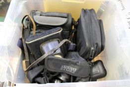 A quantity of old cameras and camera equipment.