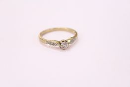 A 9ct gold and diamond ring.