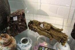 A Chinese carved hardstone figure of a sage standing on a carved base with a deer.