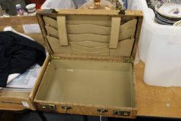 A small leather writing case.