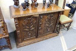 A pair of matching two door side cupboards.