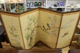 A small Chinese four fold screen.