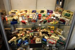 A good collection of boxed collector's cars, vans and similar items.