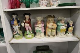 A collection of six Toby jugs.