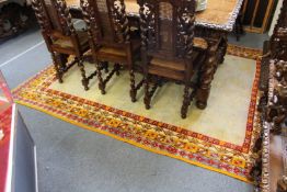 A Persian design cream ground carpet with colourful border.