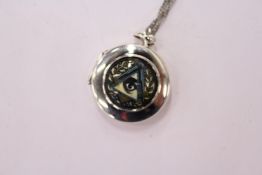 A silver Masonic locket and chain.