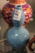 A small Chinese pale blue gourd shaped vase.