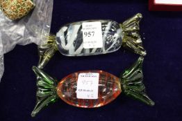 Two novelty sweet shaped glass paperweights.