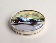 AN OVAL SILVER RACING CAR PILL BOX