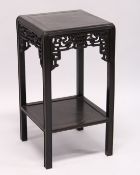 A GOOD CHINESE REDWOOD SQUARE TOP STAND with cross banded top and under tier. 1ft 5ins square, 2ft
