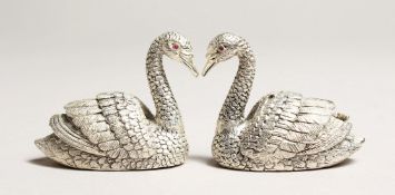 A PAIR OF .925 SILVER PLATED SWAN SALT AND PEPPERS