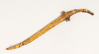AN ISLAMIC DAGGER with silver inlaid blade.