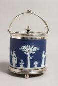 A WEDGWOOD JASPER WARE BLUE AND WHITE BISCUIT BARREL AND COVER with plated mount.