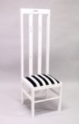 AN UNUSUAL WHITE LACQUER, OVERSIZED HIGHBACK CHAIR, in the manner of Charles Rennie Mackintosh.