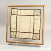 A FRAMED AND GILDED DOUBLE SIDED SILK EMBROIDERY. 17ins x 18ins.