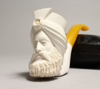 A 19TH CENTURY MEERSCHAUM PIPE as the head of a Turkish man, in a leather case.