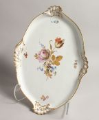 A GOOD 20TH CENTURY MEISSEN OVAL SHAPED TRAY, with gilt borders and painted with flowers. 17ins long